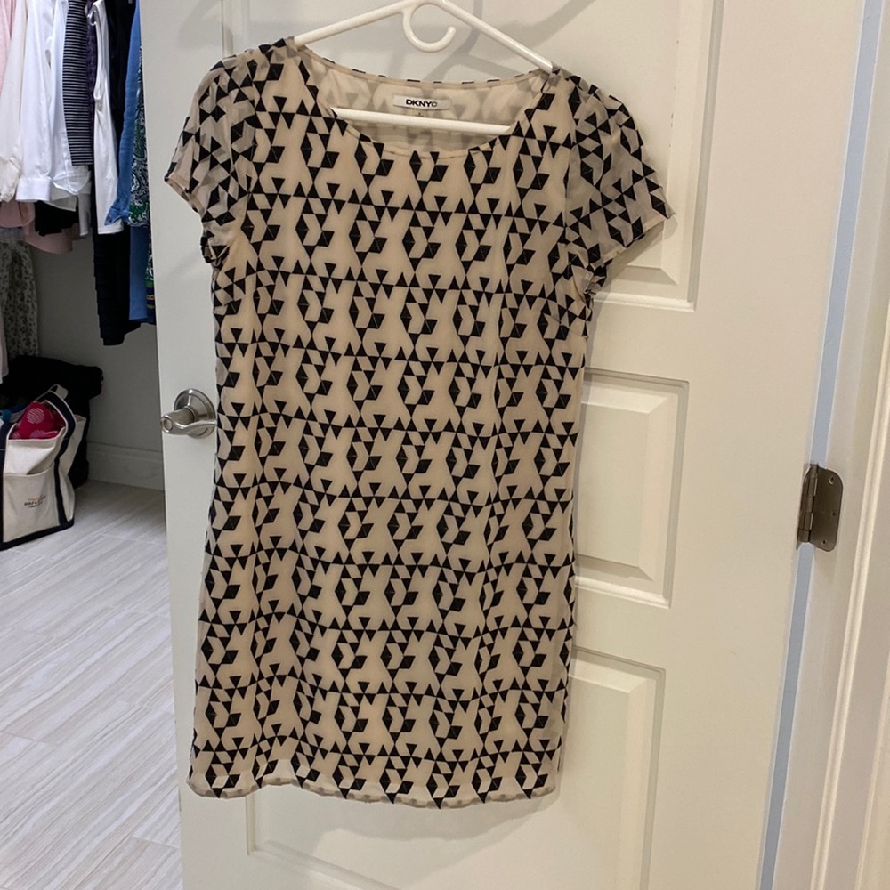 Black and Cream DKNYC dress with capped sleeves.
